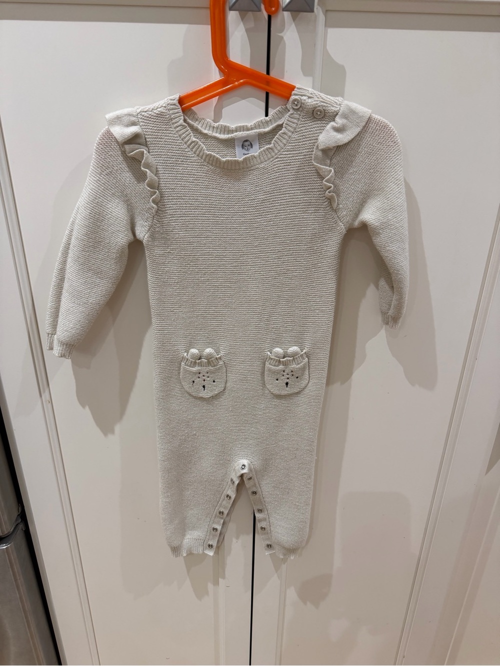 Gerber 12m knit One-Piece Romper in Cream with Ruffle Shoulders